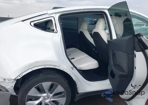 2023 Tesla Model Y Awd/Long Range Dual Motor All-Wheel Drive z USA, uszkodzony, nr VIN 7SAYGDEE9PA145270